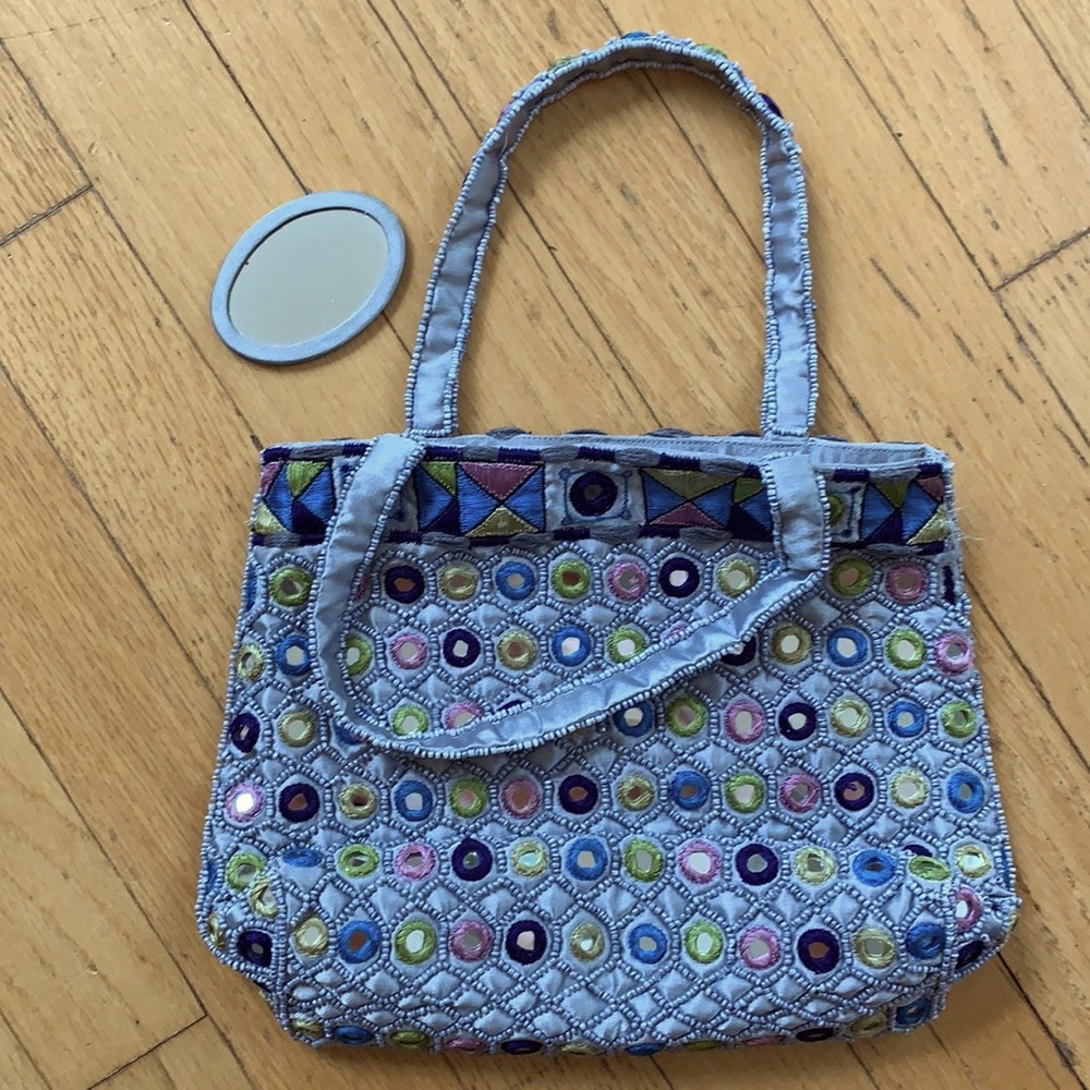 Moyna mirrored purse.